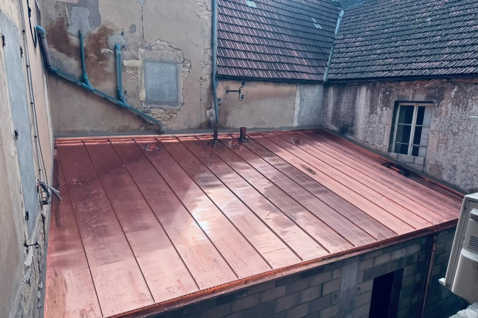 Charpente lamellé-collé et couverture cuivre à Beaune, par MS Couverture Zinguerie, vue 3 sur 4