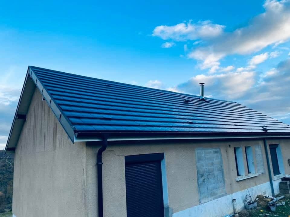 Rénovation de toiture en tuile Actua Titane à Évelle
